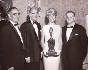 George Gus Kerasotes, right, son of Gus Kerasotes,presents Doris Day with the 1961 Star of the Year award from the Theatre Owners of America. (Contributed by Mike Kerasotes)