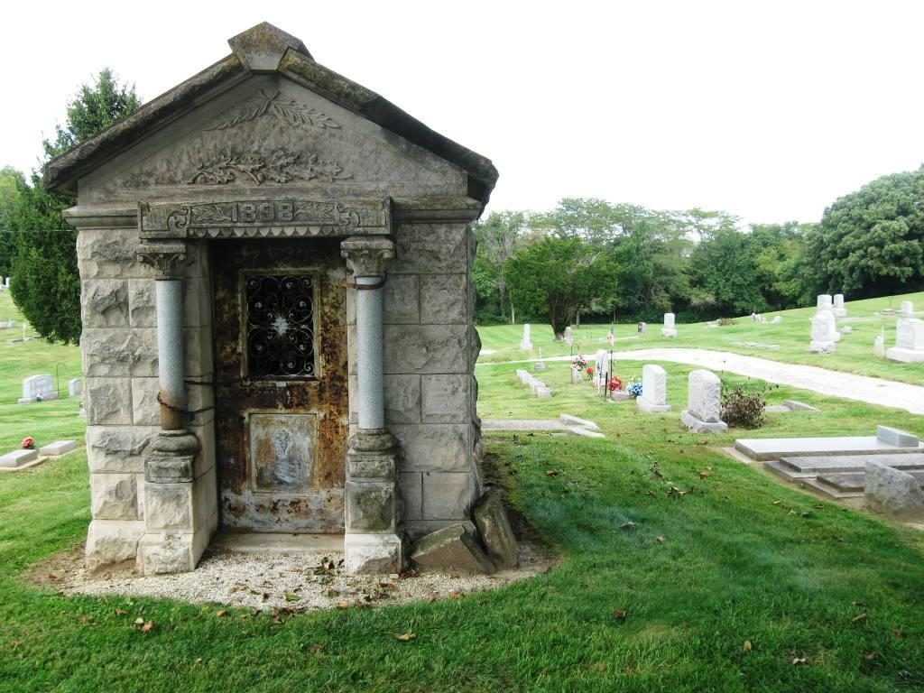 A small stone building, perhaps a receiving vault, stands near the entrance of Sulphur Springs Cemetery near Loami. The sloping vale to the north may have been created by the original sulfur spring. The "wigwam tree" would have been somewhere in the distance. (SCHS photo)