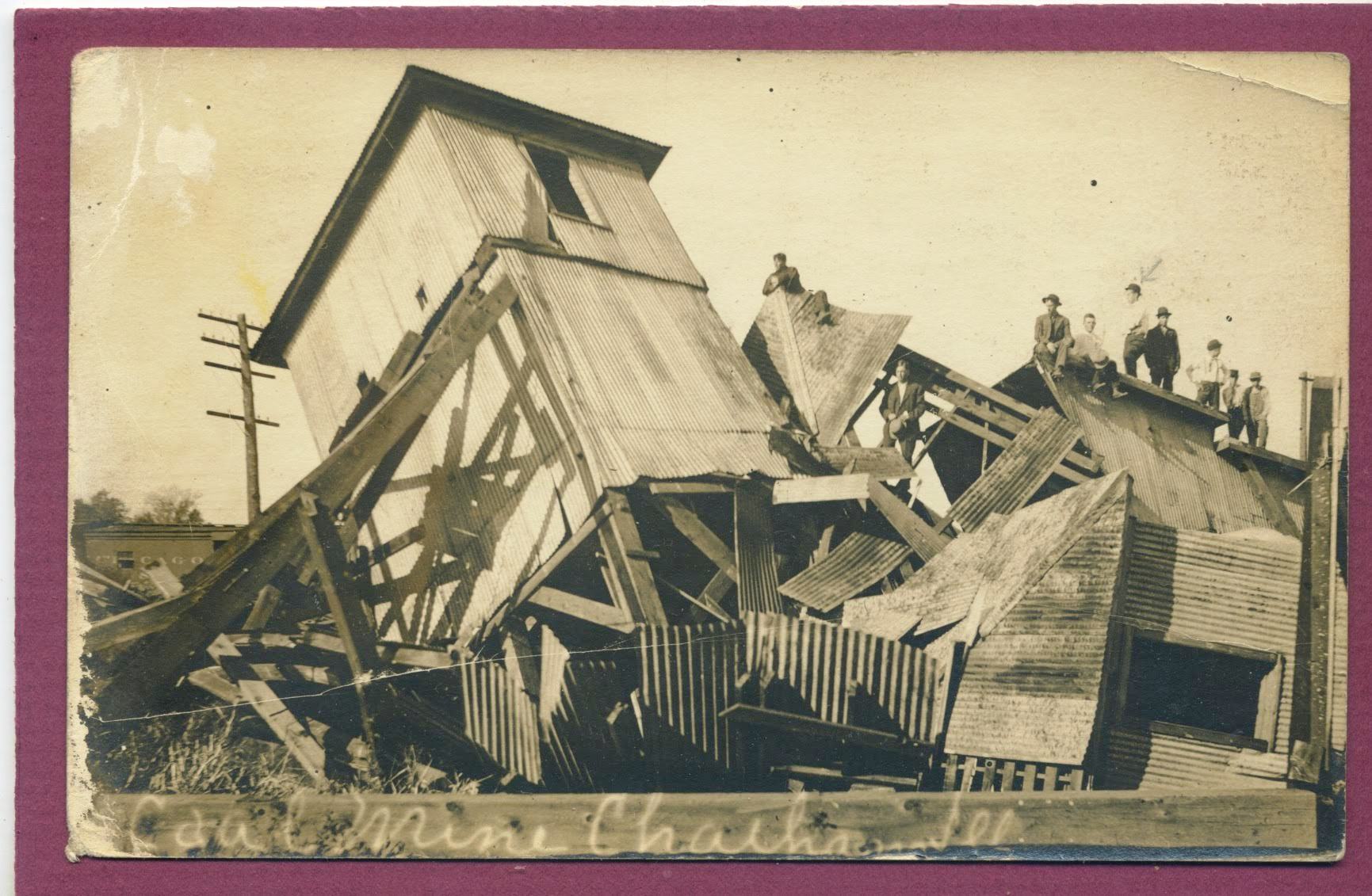 A group of men poses atop the collapsed tipple of Illinois Colleries Mine No. 8 near Chatham in 1910. (Collection of John "J.P." Taylor)
