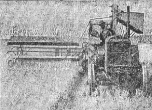 McCormick-Deering tractor-propelled combine in action, 1927 