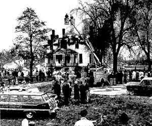 About 300 spectators hoped to see "the Old Gray Lady" destroyed by a giant blaze. They were disappointed. (Courtesy State Journal-Register)