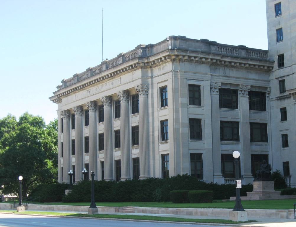 Franklin Life Insurance Co.'s 1913 headquarters building, left; part of the 1964 Seventh Street Addition can be seen on the far right, along with the complex's iconic statue of Benjamin Franklin, whom the company styled the Apostle of Thrift. (SCHS photo)