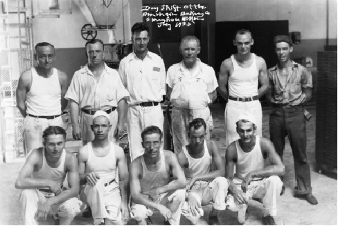 Workers inside Amrhein Bakery, circa 1935. First row, from left, Harry Monroe, Joe Koehl, Richard Kaylor, Gus Gerst, Fritz Shea, Al Zimmerman; second row, Neil Thomas, Stew Spencer, Cecil Thomas, Frank Renz, Fred Dehner, Russell Hines; third row, Frank Whitmore, Merritt Cherry. (Photo: Archives of Bob Krotz, former Amrhein driver)