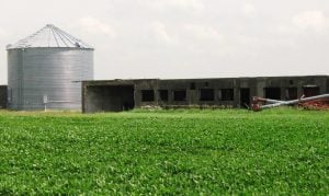 A concrete structure that apparently was a "change house" -- where workers changed into their work uniforms -- and bomb/explosion shelter for the Oak plant now is used for farm storage. (SCHS)