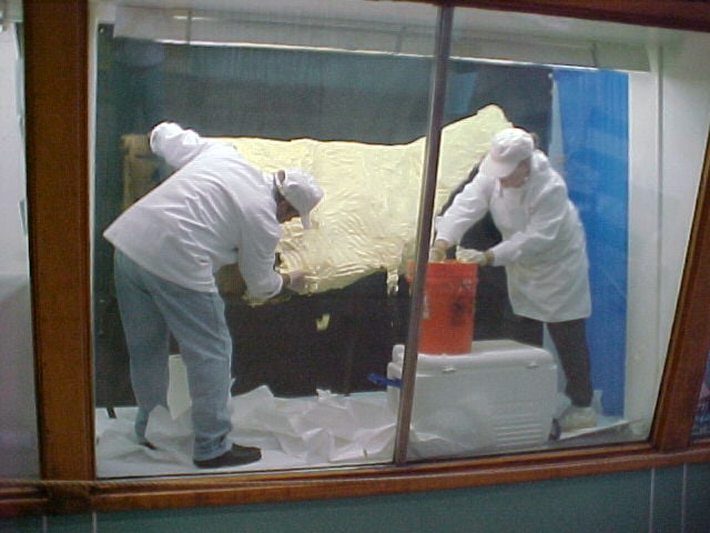 Nancy Hise and helper work on the 2002 butter cow. (Courtesy Illinois State Fair Museum/Sangamon Valley Collection/Tom Fitch)