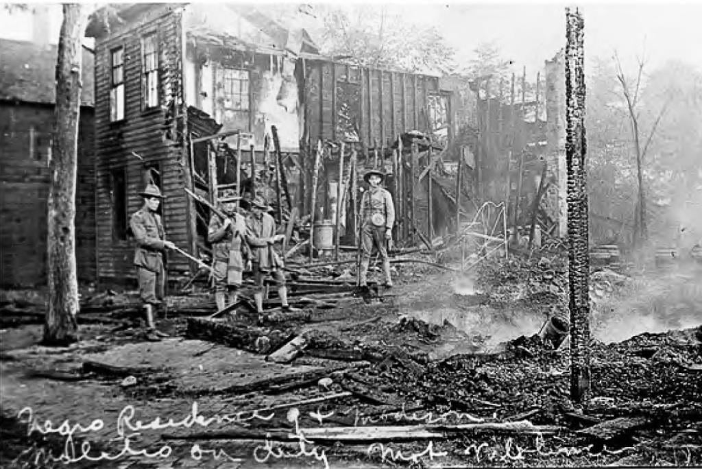 “This image (from the aftermath of the 1908 Springfield Race Riot) depicts the former “house of ill fame” initially established in the early 1870s by Emma Nash (aka Emma Taylor), and later occupied by Mabel Baxter at 913-915 East Madison Street. The adjacent building, located at 917 East Madison Street, was occupied by Charles Baxter beginning in 1896 as a saloon. It lies completely destroyed in this image. In 1908, the Baxter Resort had been closed, and this was probably the D.C. Neal residence (the manager of the adjacent saloon at thetime of the riot).” Floyd Mansberger and Christopher Stratton, 2016