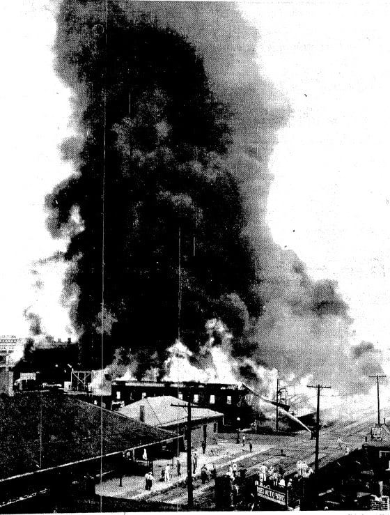 Smoke billows above the Schuck & Sons Lumber Yard, destroyed by fire on Aug. 26, 1937 (SJR)
