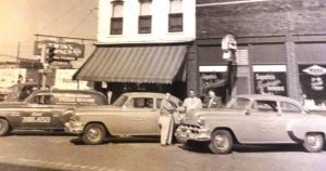 Delivery cars lined up outside the original Twins Corner (Courtesy Saputo's restaurant)