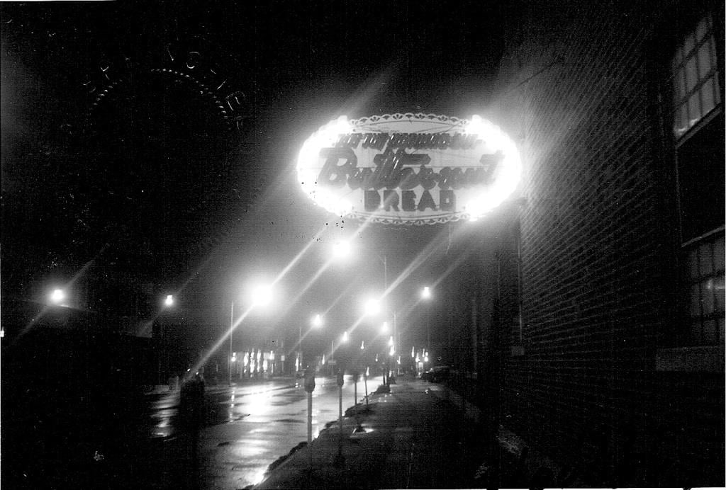The Butternut bakery sign hangs over Jefferson Street in this undated photo (Sangamon Valley Collection)