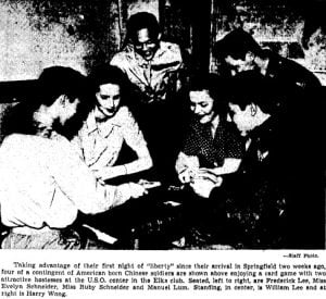 Chinese-American soldiers from the fairgrounds play cards at Springfield's USO center (courtesy SJ-R)