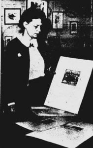 Virginia Stuart Brown in 1941, displaying an etching she had made of the Vachel Lindsay Home (courtesy State Journal-Register)